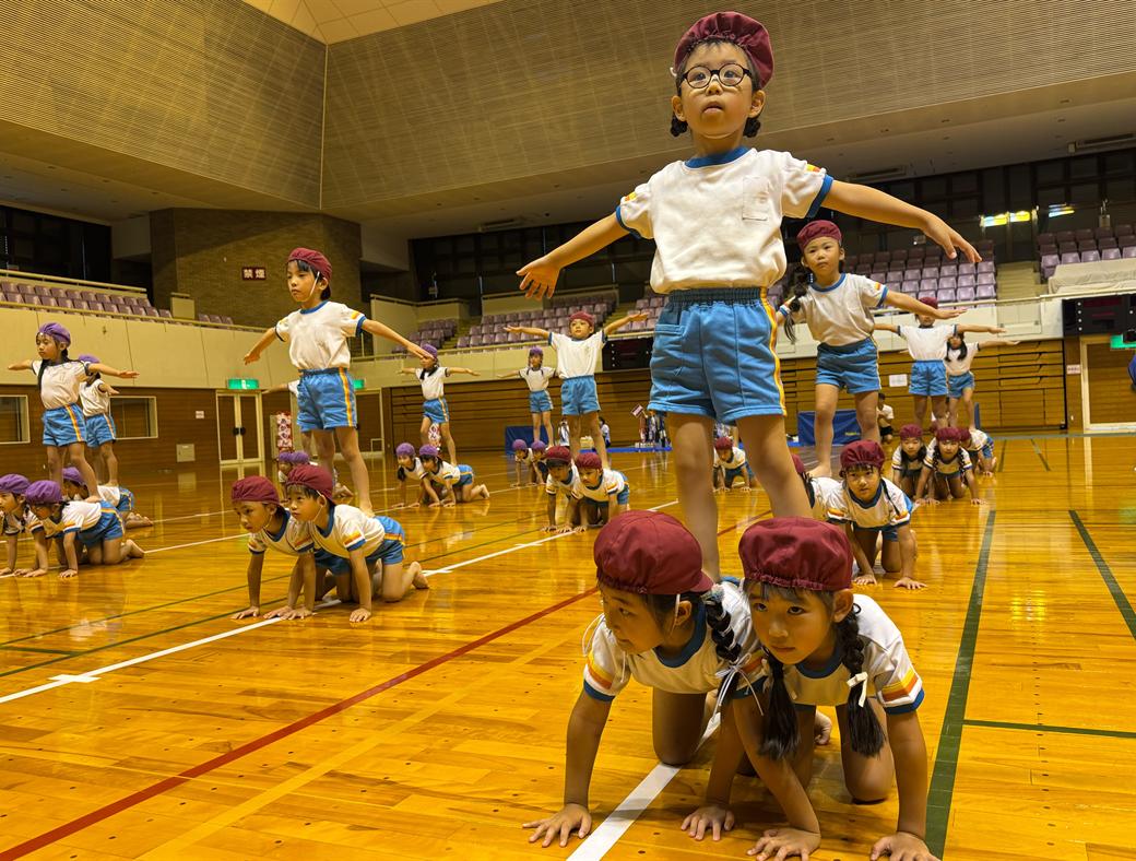 Children performing a group gymnastics routine