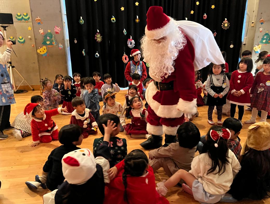 Children welcoming Father Christmas